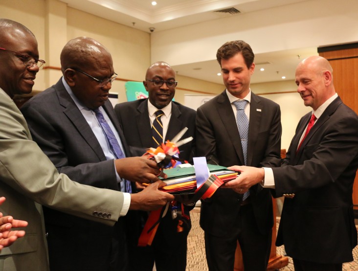 USAID Health Director John Kuehnle and the Minister of Health Chitalu Chilufya cut the ribbon on the Health Sector Supply Chain Strategy
