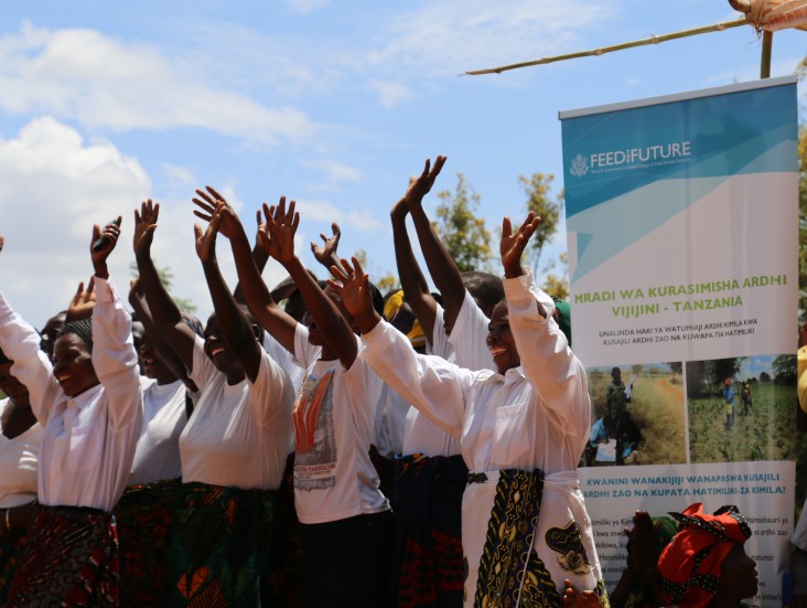 Iringa residents celebrate the completion of Feed the Future land registration efforts in their village.
