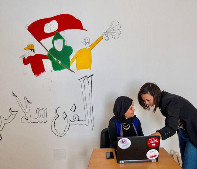 Two women with laptop Two Tunisian women with laptop