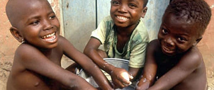 Children wash their hands in Ghana, where USAID supports prevention and treatment of trachoma, a blinding eye disease.
