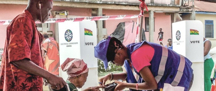 A 90-year-old woman is biometrically verified to vote on Election Day in Ghana.