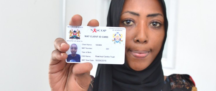 Naima, Mombasa’s first medically assisted therapy (MAT) patient, shows her MAT ID card.