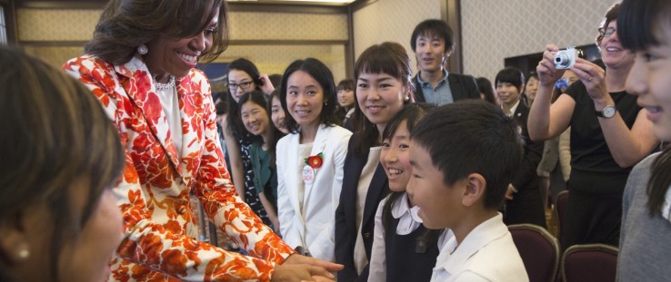 First lady Michelle Obama greets students following the Let Girls Learn announcement at the Iikura Guest House in Tokyo, Japan. 