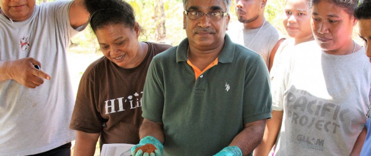 Murukesan Krishnapillai, project director, Cooperative Research and Extension Division, College of Micronesia-FSM Yap Campus, teaches community members how to improve and sustainably manage soil.