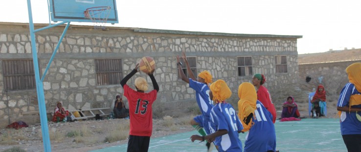 Girls practice their game during basketball camp in Garowe.