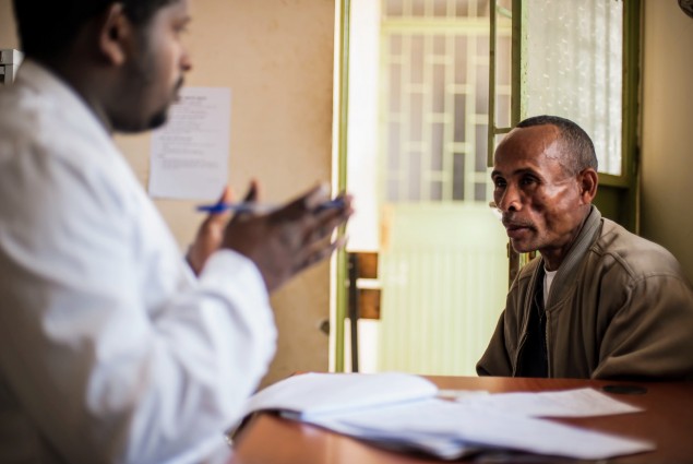 A pharmacist counsels a patient at a hospital in Amhara Region. The new pharmacy set up that came about as a result of Auditable Pharmaceutical Transactions and Services allows patients to sit face to face with pharmacists and get information on prescribed medication. 