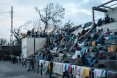 People stay in shelter at the stands of Ring ground in Buzi, Mozambique, on March 23, 2019, after the area was hit by the Cyclone Idai.