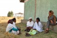 Natsaannat, a health extension worker in Wara Village, meets with the female development army for weekly updates on their villages, including number of women pregnant and children vaccinated.