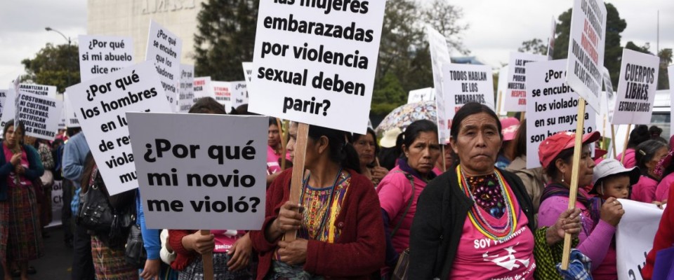Women of Guatemala marched for their rights on Women’s Day on March 8, 2017. / AFP