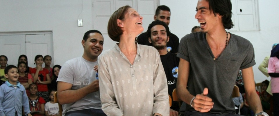 USAID/Egypt Mission Director Sherry F. Carlin role plays with community volunteers from UN Women's Safe Cities project