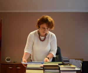 Chief Judge Enkeledi Hajro of the Tirana District Court reviews her documents.