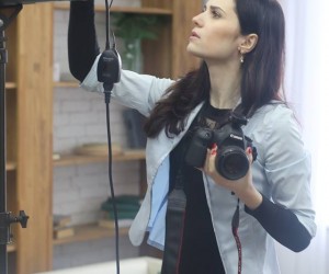 Valentina Ushakova checks equipment before photo shoot.