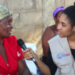 Journalist interviews woman