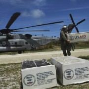 Aid is unloaded from a US helicopter in Jeremie, southwest of Port-au-Prince, Haiti