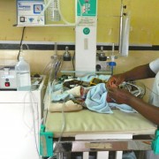 A newborn with respiratory distress at Queen Elizabeth Central Hospital in Blantyre, Malawi, breathes easier with the help of th