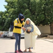 Election monitor with Tunisian voter
