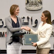 USAID/Egypt Mission Director Sherry F. Carlin and Minister of Investment and International Cooperation Dr. Sahar Nasr shake hands after signing bilateral assistance agreements worth $59 million.