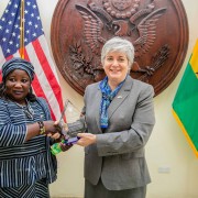 Ambassador Sullivan presents the GWOC award to Stella Saaka