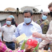 Ambassador Earl Miller meets with families in Madhya Khatiamari village receiving emergency relief from a U.S. government-funded program.