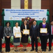 U.S. Ambassador Rena Bitter (Second from left) and Minister of Health Dr. Bounkong Sihavong (fifth from left) celebrate Elimination of Trachoma along with officials from Laos and the international community.