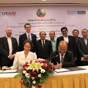 Mr. Sypaphai Xaisongkham (seated on right), Director General of Department of Technical Extension and Agro-processing, joined Ms. Sophie Walker (seated on left), Chief of Party ACDI/VOCA Laos, to sign the MOU while U.S. Chargé d’Affaires Colin Crosby (standing, fifth from left) and Dr. Bounkhouang Khambounheaung (standing, sixth from left), Vice Minister of Agriculture and Forestry, witnessed the October 4 event in Vientiane. 