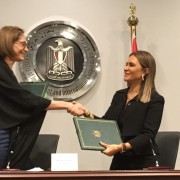 USAID/Egypt Mission Director Sherry F. Carlin and Minister of Investment and International Cooperation Dr. Sahar Nasr shake hands after signing bilateral assistance agreements worth $16.5 million.