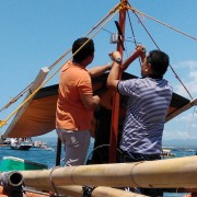 A transponder is installed on a small-scale vessel outside of General Santos City, the Philippines.