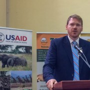 USAID/Tanzania Acting Deputy Mission Director Greg Butler congratulates the Government of Tanzania, conservation partners, and the USAID PROTECT project for their role in finalizing the National Chimpanzee Conservation Action Plan.