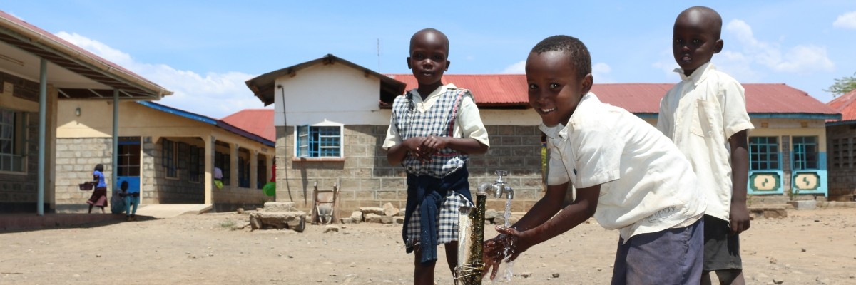 Children wash their hands at a primary school in Baringo County. Afya Uzazi is helping school health clubs and community groups to integrate hygiene promotion in Baringo and Nakuru counties. 